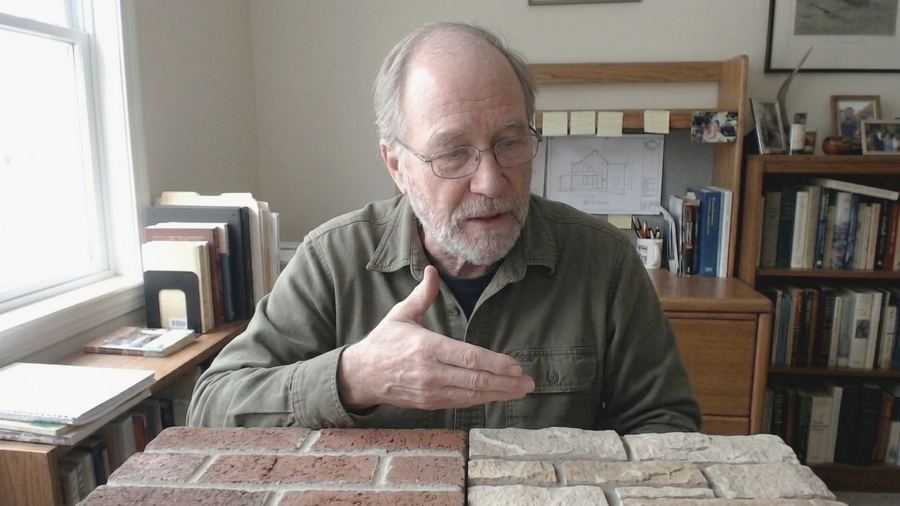 Tom Bennett with brick and stone samples
